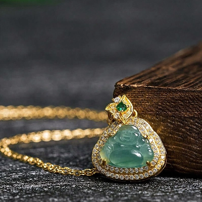 Side view of jade Buddha necklace showing gold cable chain and diamond-cut border detailing