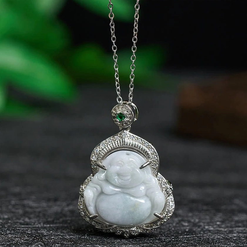 Natural jade Laughing Buddha pendant necklace front view with silver crystal frame and green gem bail