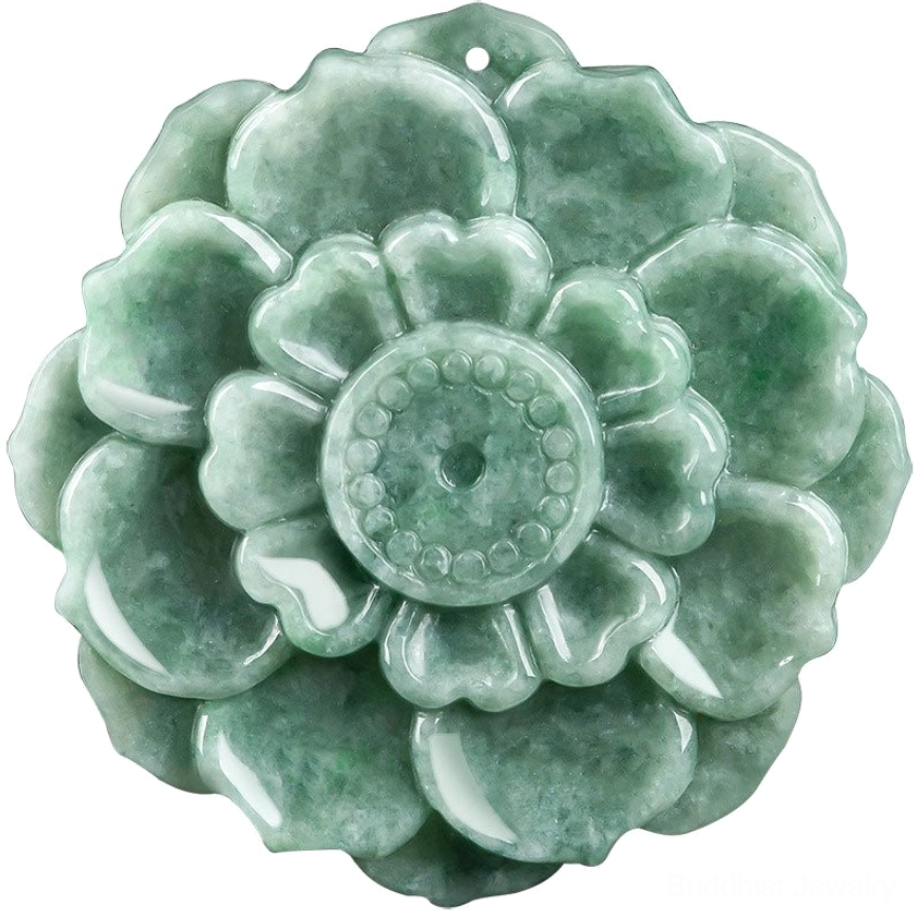 Extreme close-up macro photography of jade lotus pendant showing intricate carved petal texture and circular central carving