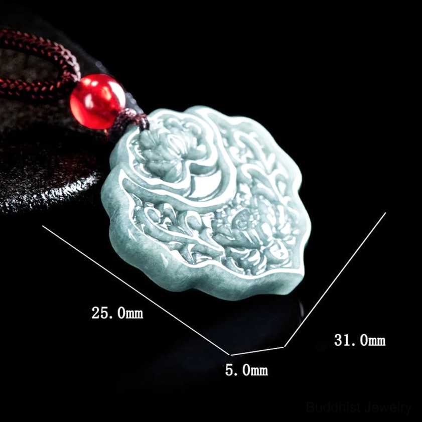Jade lotus pendant necklace with size measurement labels, side view showing exact dimensions of carved Buddhist pendant on leather background