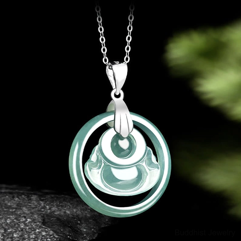 Jade prosperity pendant necklace back view - reverse side of circular frame showing intricate detail on dark stone display