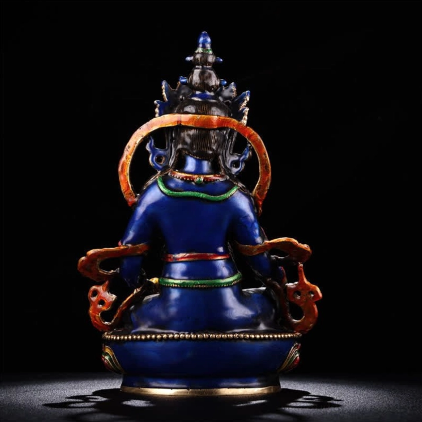 Yellow Jambhala Bodhisattva figurine rear view showing plain copper blue body circular head halo and base