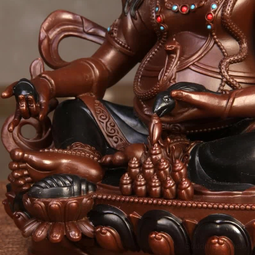 Jambhala Buddha statue front view with clear base edge and design details