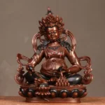 Yellow Jambhala copper buddha statue front view with ornate crown and gemstone inlays