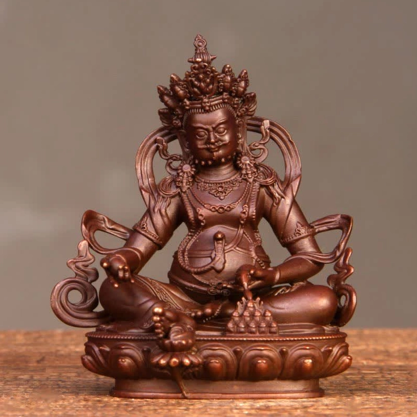 8.5cm Yellow Jambhala statue - compact desk and office display piece