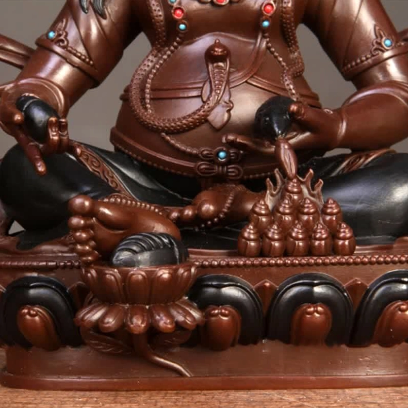 Yellow Jambhala Bodhisattva statue with gemstone decorative accents and crown
