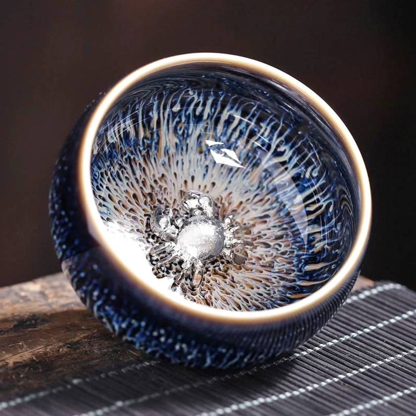 Jian Zhan ceramic tea cup dragon zodiac sign design with powerful kiln-fired glaze and auspicious luck meaning