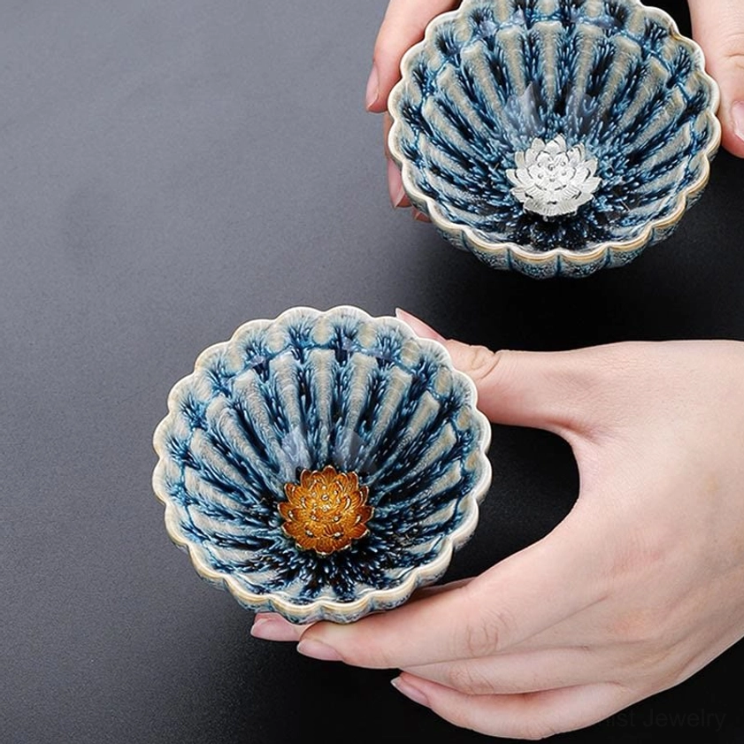 Jian zhan buddhist lotus tea cup detail shot showing crystalline glaze and petal texture