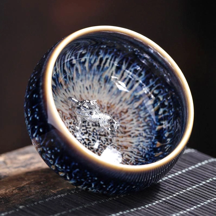 Jian Zhan ceramic tea cup ox zodiac sign design with steady grounding energy and natural mineral glaze