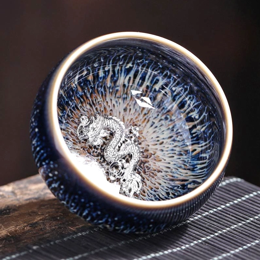 Jian Zhan ceramic tea cup rat zodiac sign design with handmade glaze pattern and mineral-rich iron finish