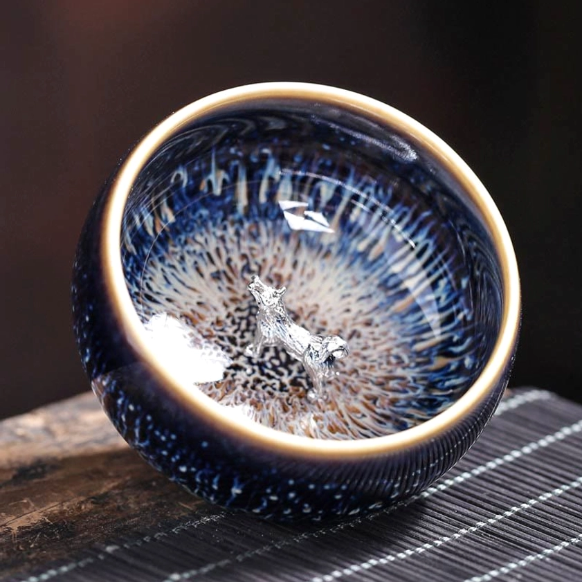 Jian Zhan ceramic tea cup rooster zodiac variant with iron-rich glaze pattern for mindful tea ceremony