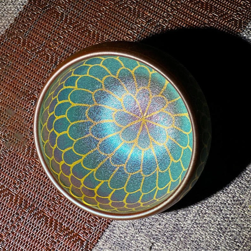 Artisan Jianzhan lotus pattern ceramic teacup with blue-purple gradient and gilded petal details, authentic handcrafted teaware
