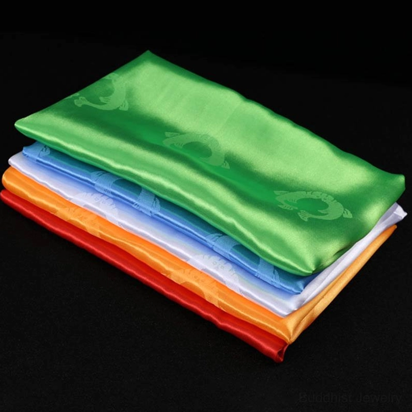 Single khata scarf close-up shot showing embossed religious motifs high-quality satin fabric and detailed craftsmanship