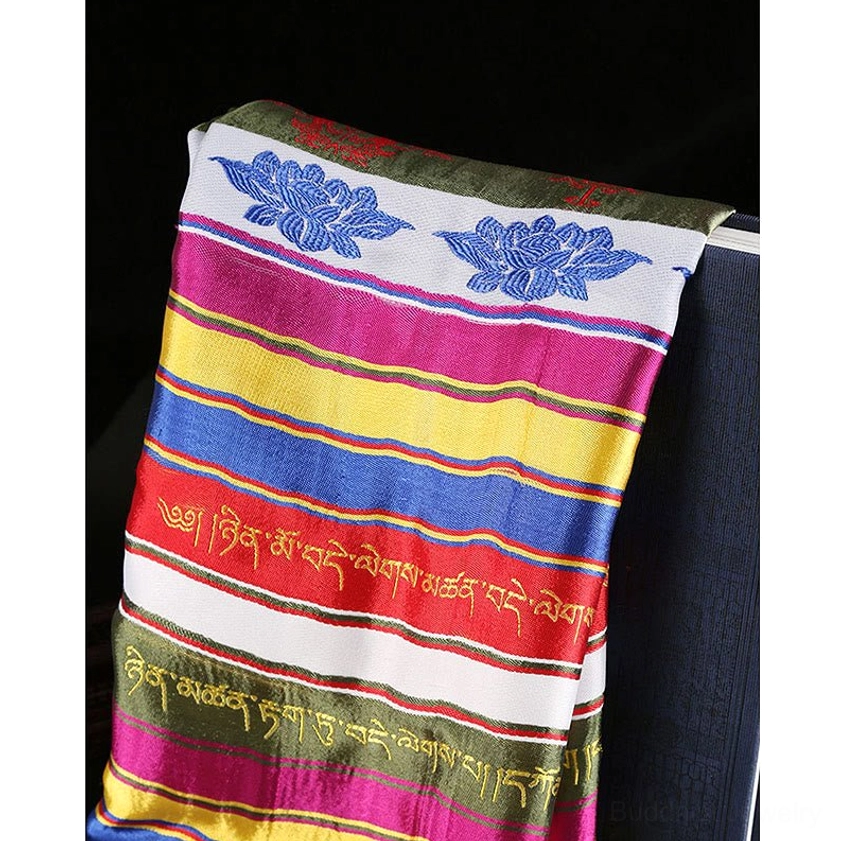 Multicolored Buddhist Khata scarf with vibrant striped design and sacred embroidered details for gifting