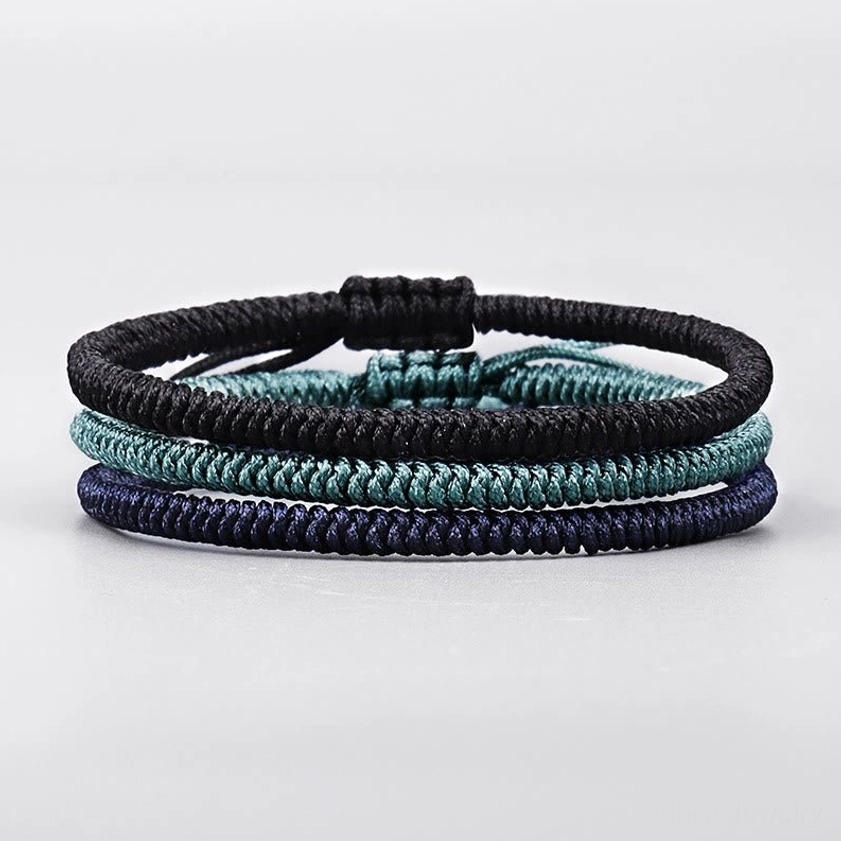 Stacked King Kong knot Buddhist bracelets showing layered 3-color variant options for strength and protection