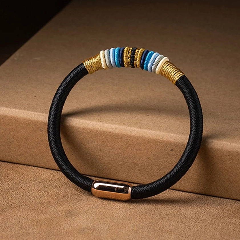King kong knot magnetic bracelet flat lay showing construction and materials