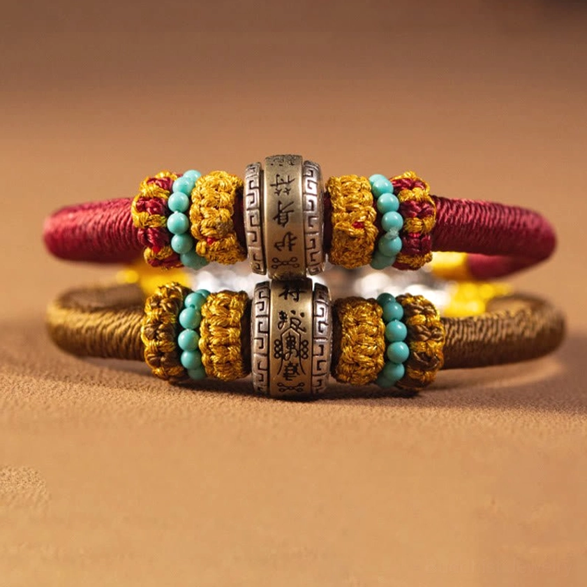 Handmade Buddhist lucky bracelet styled with meditation props and spiritual wellness items