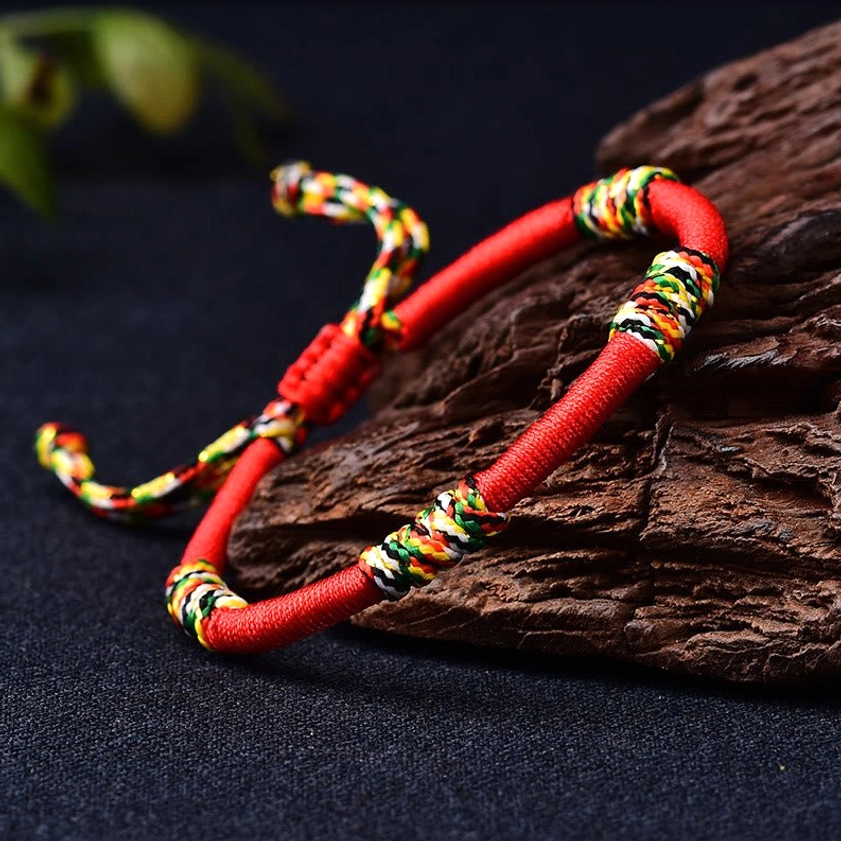 Handcrafted Buddhist King Kong knot bracelet with vibrant woven knots and natural fiber design