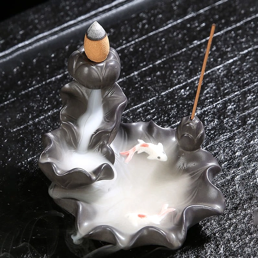 Front angle ceramic koi fish backflow incense burner with layered lotus structure and flowing smoke