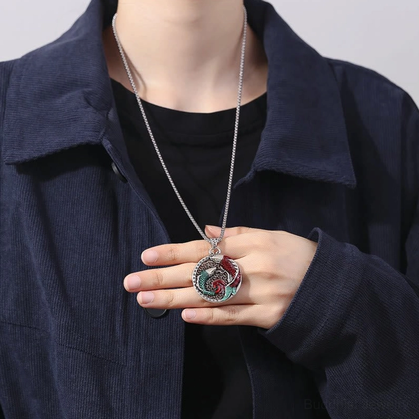 Model wearing copper koi fish Buddhist prosperity necklace on chest with black shirt casual daily wear
