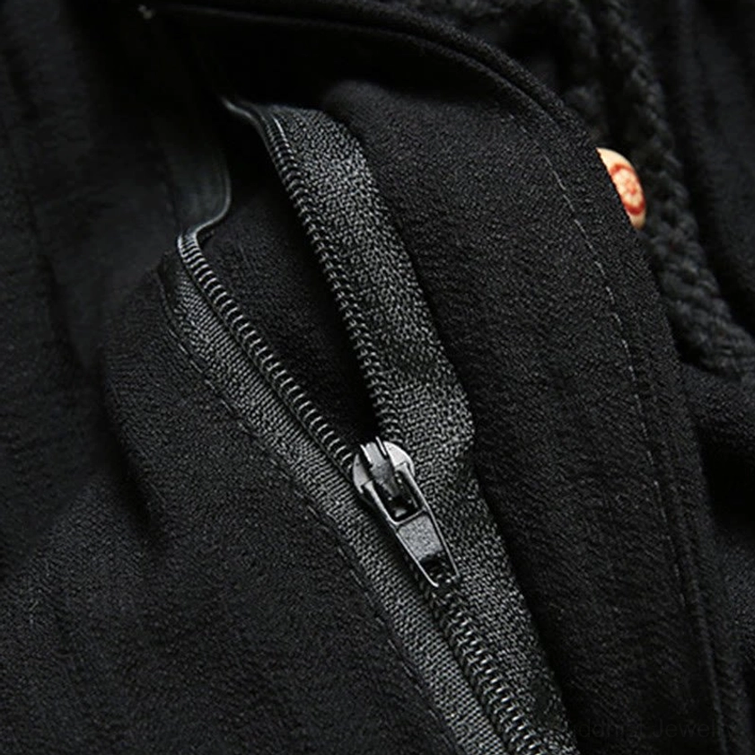 Tang suit pants metal zipper and red bead closure fastener detail, premium hardware