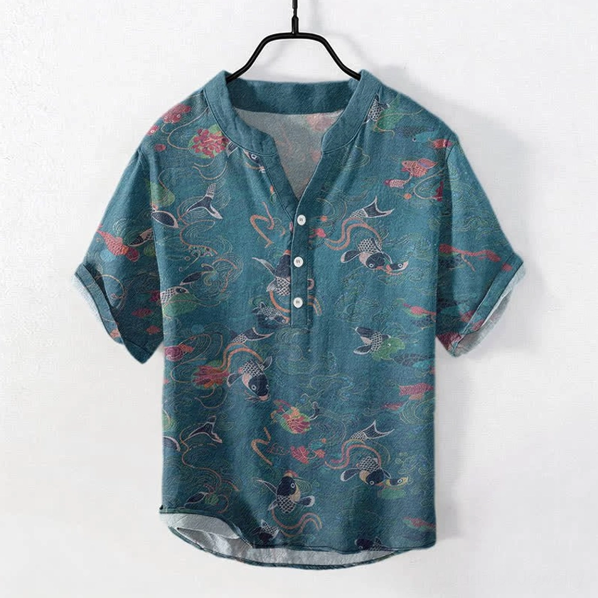 Men's koi fish lotus print half-button shirt in teal blue, front flat lay with oriental design