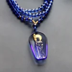 Ksitigarbha Bodhisattva blue gradient Liuli crystal pendant necklace with golden halo and khakkhara staff, overhead front view