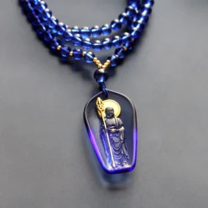 Ksitigarbha Bodhisattva blue gradient Liuli crystal pendant necklace with golden halo and khakkhara staff, overhead front view