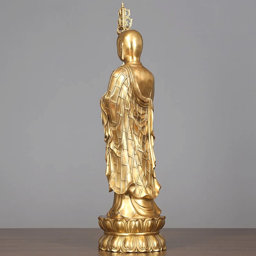 Ksitigarbha Bodhisattva copper statue polished gold finish showing craftsmanship and spiritual presence