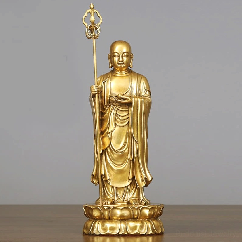 Single standing Ksitigarbha Bodhisattva statue close-up frontal view with detailed robe carvings