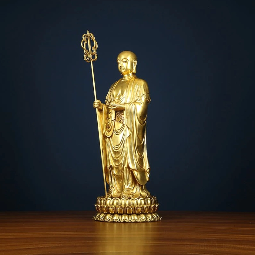 Ksitigarbha Bodhisattva statue low-angle left front view standing posture with sacred staff and gold finish