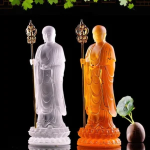 Pair of white and amber Ksitigarbha Bodhisattva liuli crystal statues with golden khakkhara staffs and lotus bases