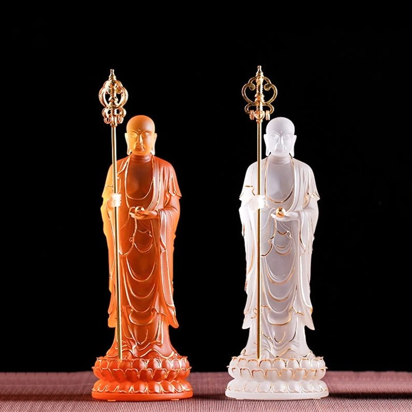 Right profile view of white frosted Ksitigarbha Bodhisattva liuli crystal statue on dark backdrop