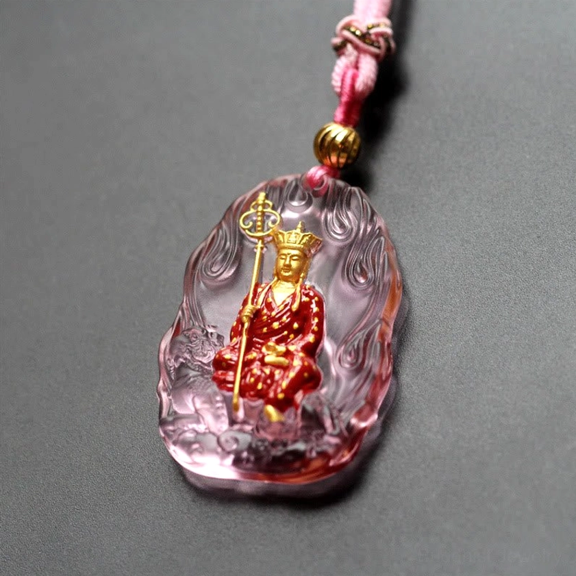 Pink-purple translucent Ksitigarbha Buddha liuli crystal pendant with flame frame, seated red-gold Buddha figure, paired with pink braided rope necklace