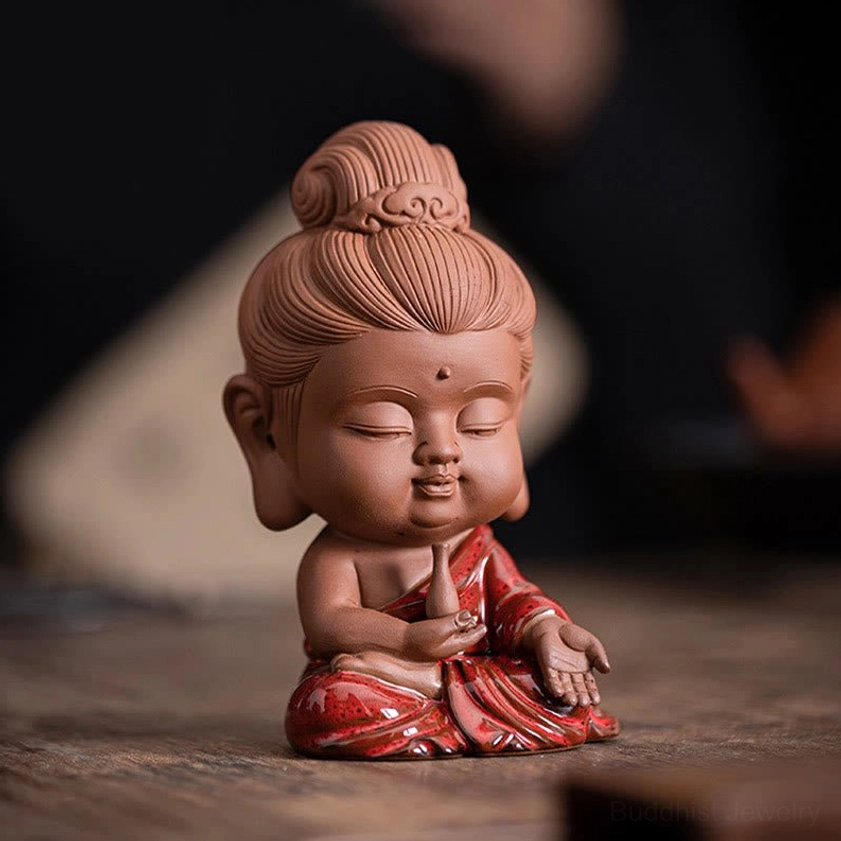 Buddhist Ksitigarbha figurine miniature ceramic statue protector of children and travelers with spiritual protection symbolism