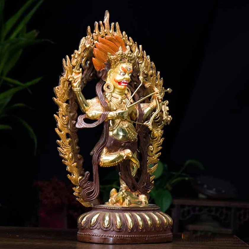 Kurukulla fierce compassion deity three-quarter angle view holding bow and arrow with ornate skull crown dynamic dancing pose