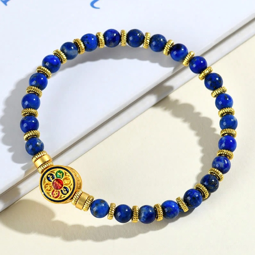 Handmade lapis lazuli Buddhist bracelet with colorful enamel charm and gold spacers