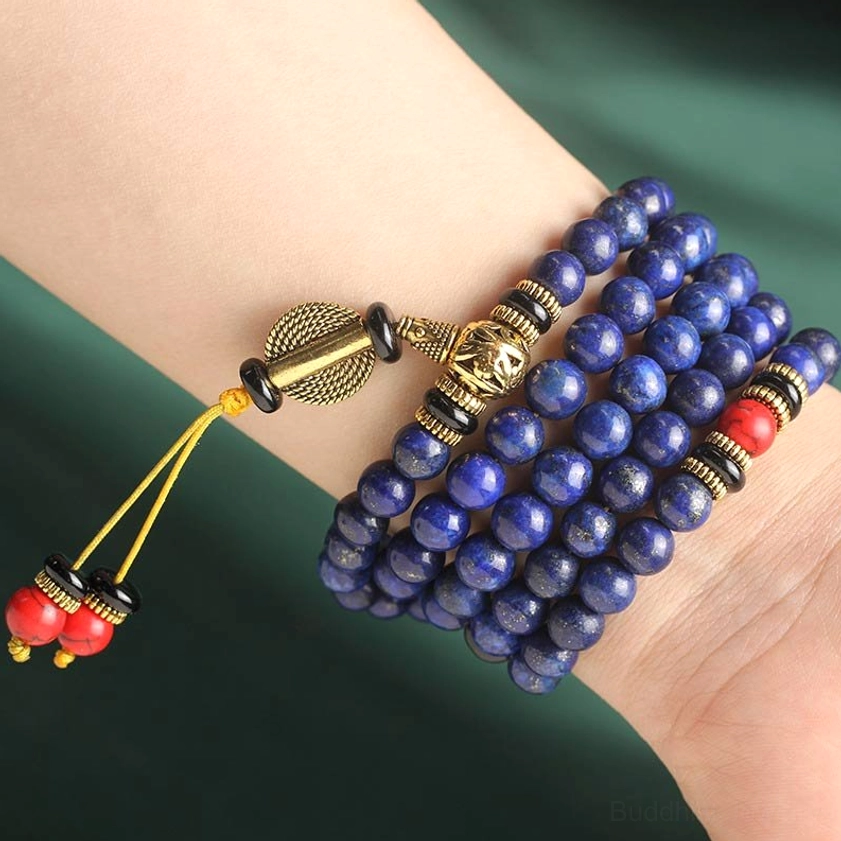 Buddhist prayer mala with lapis lazuli beads for meditation and spiritual practice featuring natural deep blue gemstones