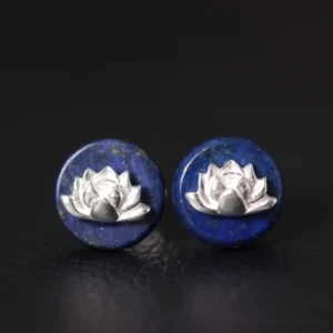 Lapis lazuli lotus stud earrings with 925 sterling silver front view on dark textured background