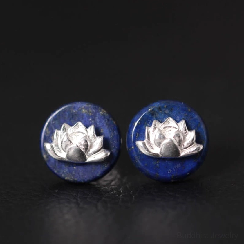 Lapis lazuli lotus stud earrings with 925 sterling silver front view on dark textured background