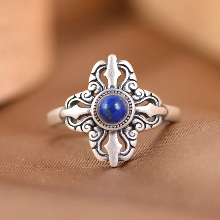 925 sterling silver lapis lazuli adjustable ring with vajra cross design, top-down view showing deep blue stone with golden pyrite