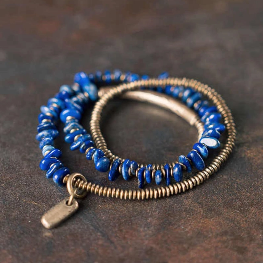 Lapis lazuli triple wrap bracelet with antiqued bronze beads and hanging charm tag, handmade Buddhist crystal bracelet for balance