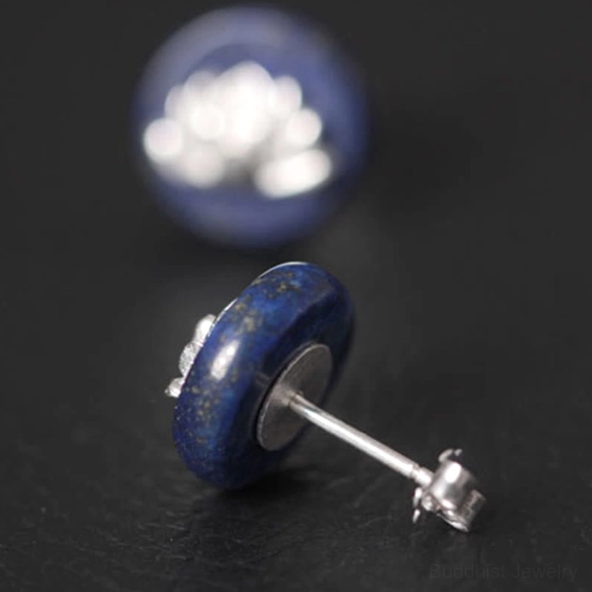 Oblique angle view of lapis lazuli lotus stud earring showing stone and silver post detail