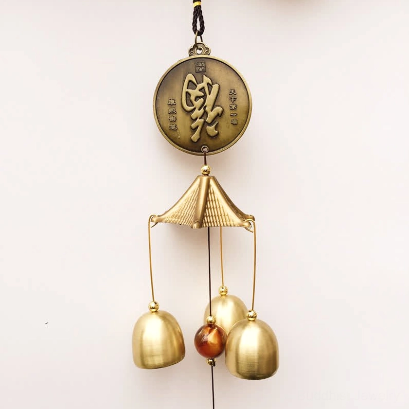 Large bronze Fu coin wind chime with pagoda hanger, three brass bells and amber bead accent for prosperity