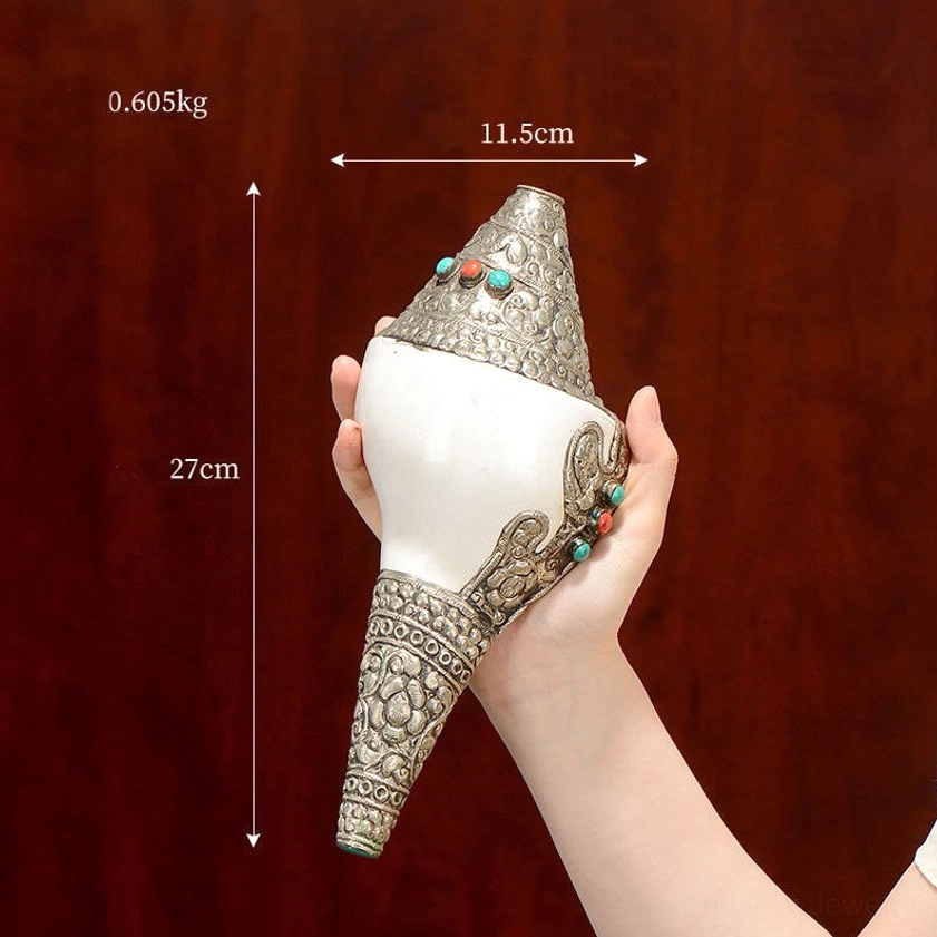 Large shankha conch shell 27cm with elaborate silver floral carvings and gemstone inlays showcasing artisan craftsmanship