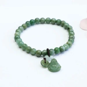 Laughing Buddha Cyan Jade bracelet with hand-carved Buddha charm and 6mm round green jade beads on premium elastic string, overhead flat lay view