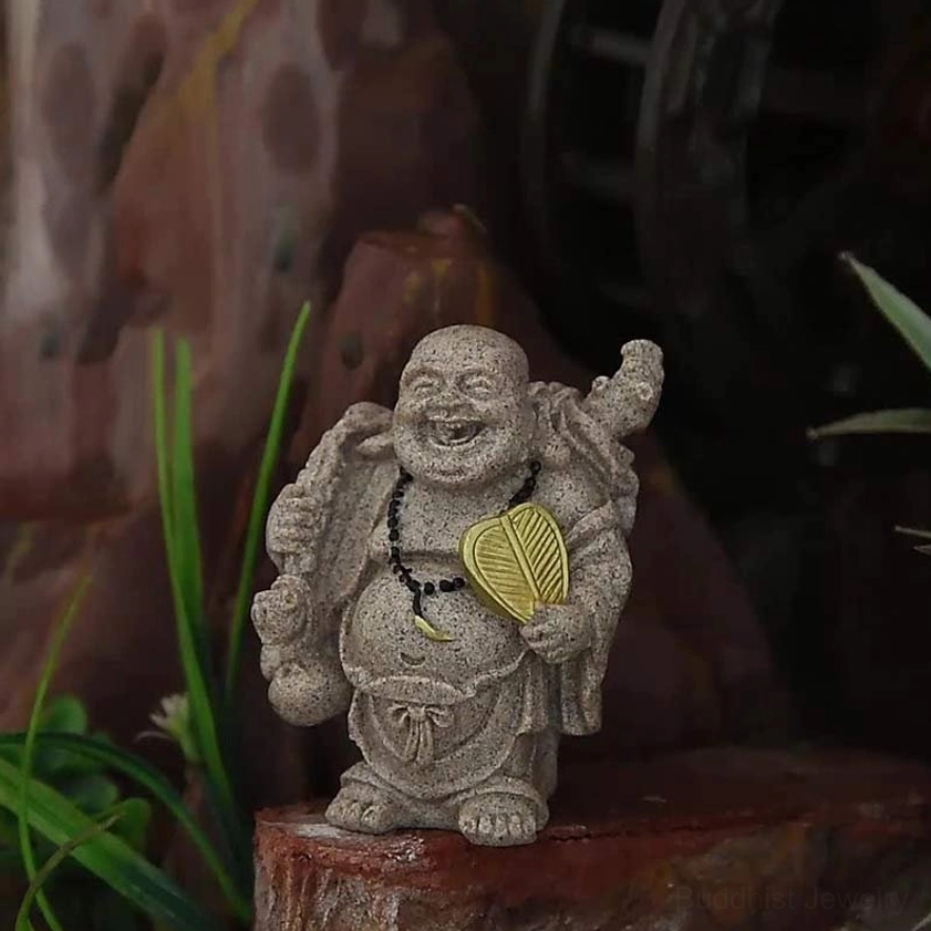 Laughing Buddha carrying gourd in garden setting, handmade resin statue showing outdoor placement versatility