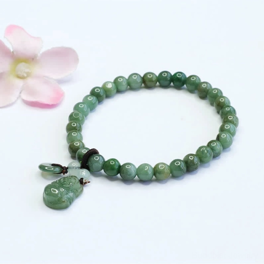 Laughing Buddha Cyan Jade Buddhist charm bracelet featuring round green jade beads with dark knot and small jade accent pendant