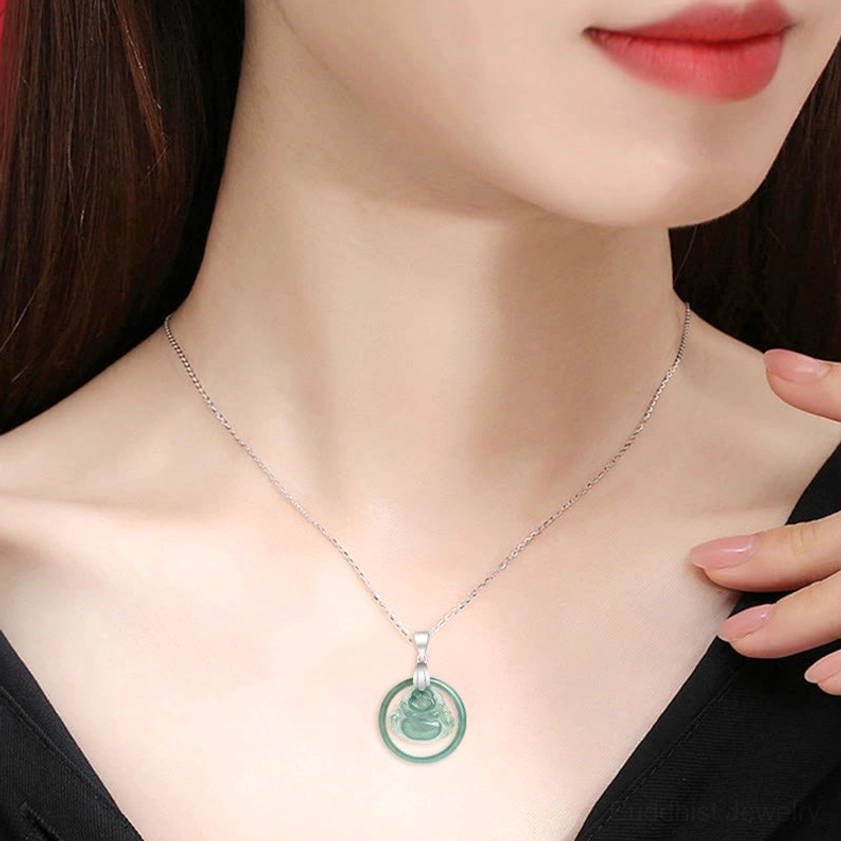 Laughing Buddha jade necklace neck close-up - silver chain and green jade pendant worn at clavicle for everyday styling