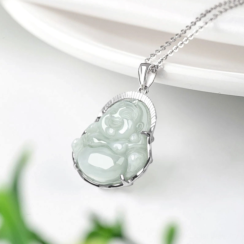 Laughing Buddha jade pendant right side view with twisted silver chain displaying natural jade color variations